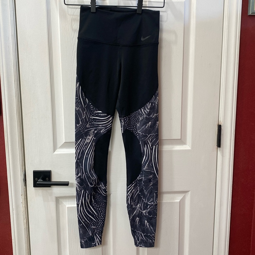 - NWOT nike feather leggings